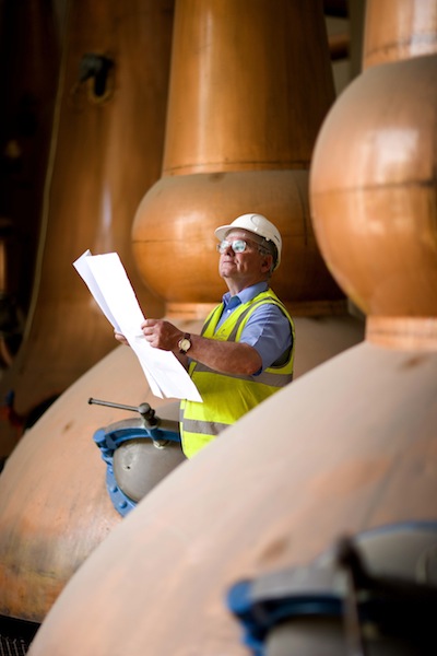 Operations manager Hamish Proctor looks over plans by Chivas Brothers to reopen Glen Keith Distillery in Speyside.