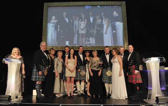Daivd Urquhart pictured with Susan Young editor of The DRAM magazine and members of the Urquhart family